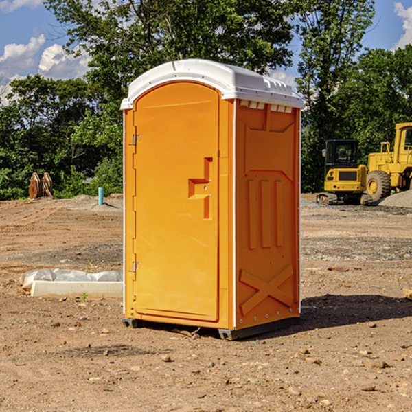 how often are the portable restrooms cleaned and serviced during a rental period in Savoy